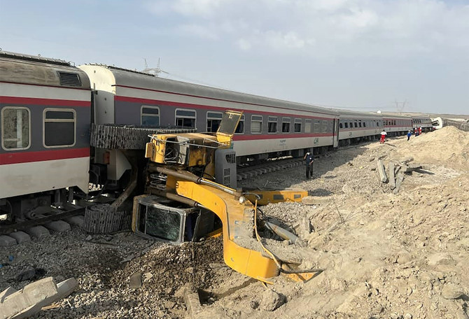 Above, the train derailed after hitting an excavator near the central Iranian city of Tabas, on the line between the cities of Mashhad and Yazd. (Iranian Red Crescent via AFP)