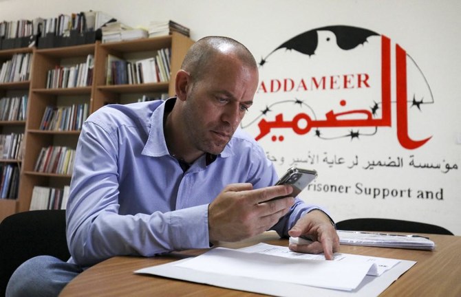 French-Palestinian lawyer Salah Hamouri is one of several Palestinian activists whose phones were hacked using the Pegasus malware, according to a report in November by human rights groups. (AFP)