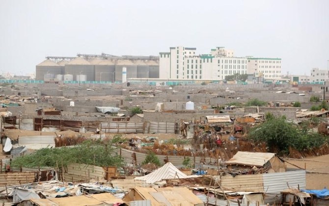 Hodeidah port's grain silos are pictured from a nearby shantytown in Hodeidah, Yemen, June 16, 2018. (Reuters)