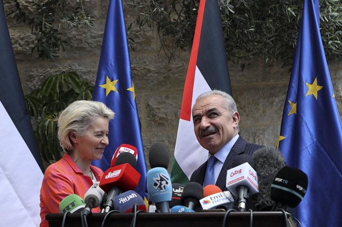 Palestinian PM Mohammad Shtayyeh and the President of the European Commission Ursula von der Leyen give a joint press statement in Ramallah in the occupied West Bank on Tuesday. (AFP)