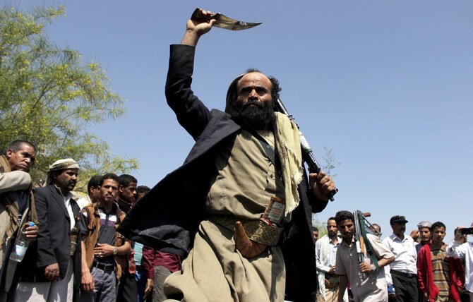 Members of the Houthi militia attend a demonstration in the second largest city of Taiz. (File/AFP)