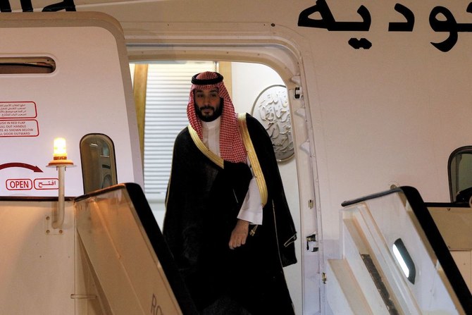 Saudi Crown Prince Mohammed bin Salman disembarks off his aircraft upon arrival at Queen Alia International Airport in Jordan's capital Amman on June 21, 2022. (AFP)