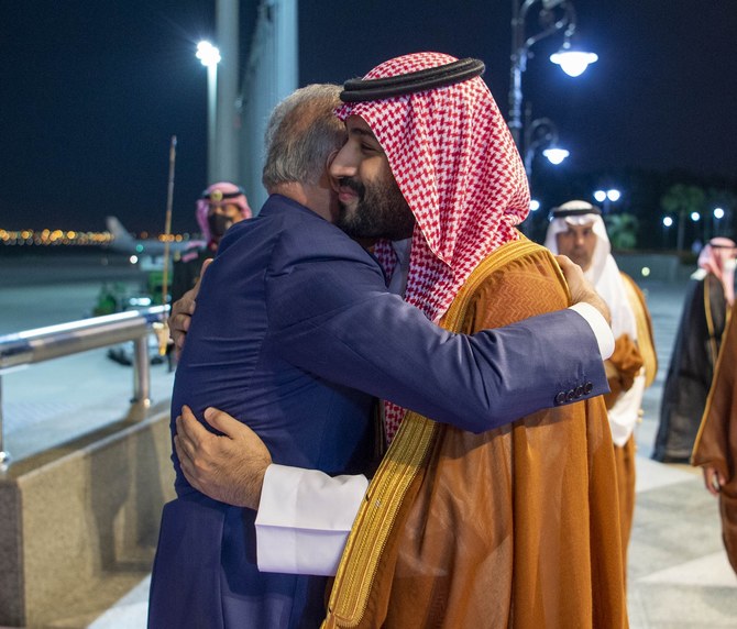 Crown Prince Mohammed bin Salman welcomes Iraqi Prime Minister Mustafa Al-Kadhimi (L) in Jeddah on Saturday night. (SPA)