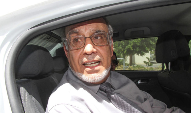 Hamadi Jebali (C) Tunisian politician and former prime minister is pictured after submitting his candidacy for the upcoming early presidential elections, in the capital Tunis on August 6, 2019. (AFP)