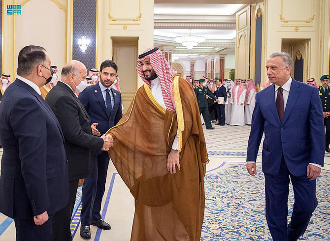 Saudi Crown Prince Mohammed bin Salman interacts with members of Iraqi Prime Minister Mustafa Al-Kadhimi's delegation. (SPA)