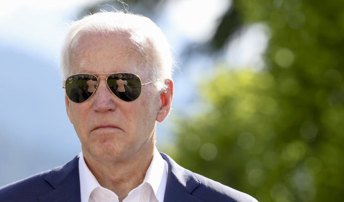 European Commission President Ursula von der Leyen is reflected in US President Joe Biden's sunglasses during the first day of the G7 leaders' summit in Germany, Sunday, June 26, 2022. (AP)