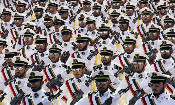 Members of the Islamic Revolutionary Guard Corps Navy march during a parade to commemorate the anniversary of the Iran-Iraq war, in Tehran, Sept. 2011. (Reuters)