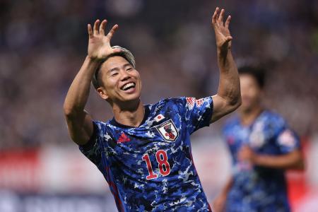 Japan's forward Takuma Asano celebrates his goal during the international football friendly match between Japan and Paraguay at Sapporo Dome in Sapporo, Hokkaido prefecture on June 2, 2022. (AFP)