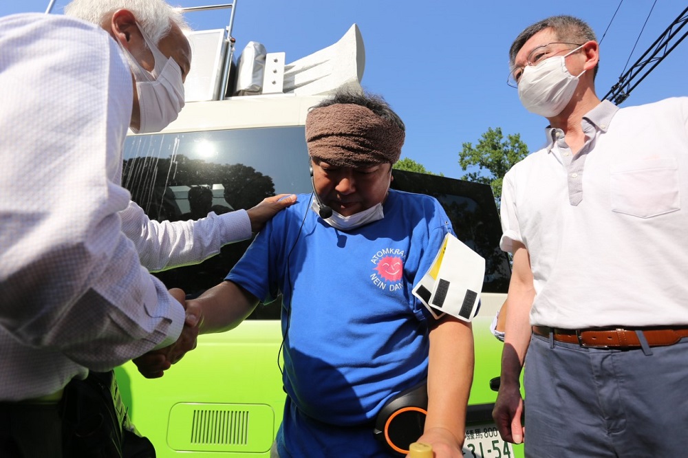 A man is left heartbroken after the decision by the Supreme Court decided the Japanese state is not liable for damages from the Fukushima nuclear accident. (ANJ/Pierre Boutier)
