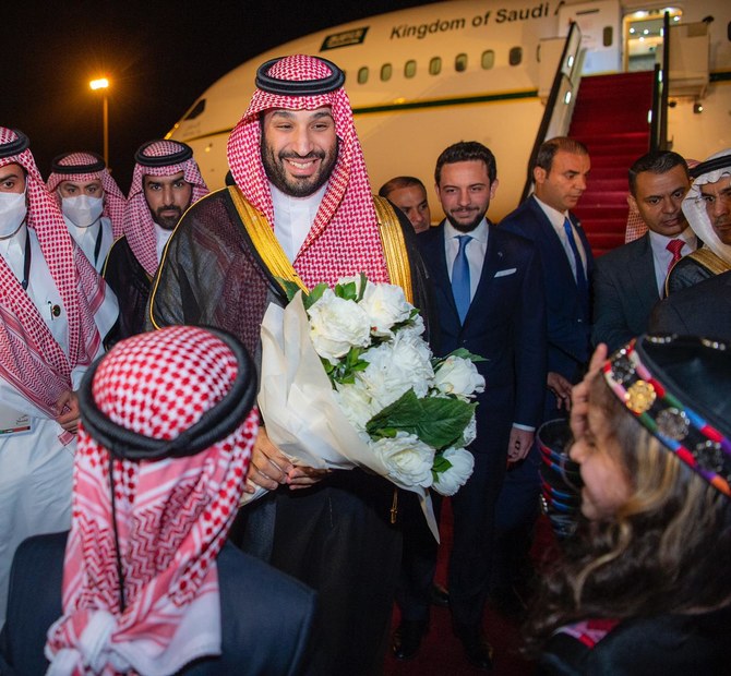 Saudi Crown Prince Mohammed bin Salman is greeted by King Abdullah II on arrival in Amman on Tuesday. (SPA)