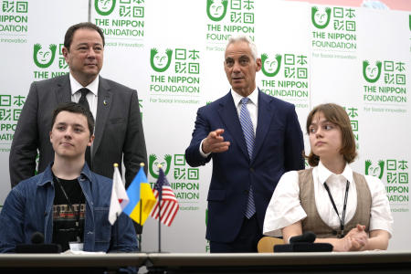 US Ambassador to Japan Rahm Emanuel (back right), and Ukrainian Ambassador to Japan Sergiy Korsunsky attend a news conference with Ukrainian refugees at the Nippon Foundation in Tokyo, Monday, June 13, 2022. (AP)