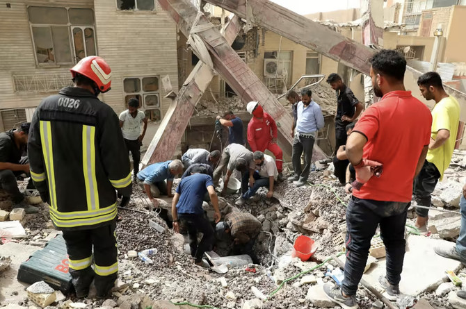 Rescuers search the rubble in Abadan. (AFP)