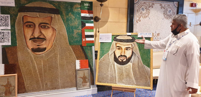 Hisham Al-Najjar now hopes to sell his paintings to those interested in creative and distinctive artworks. (Photo/Saleh Fareed)