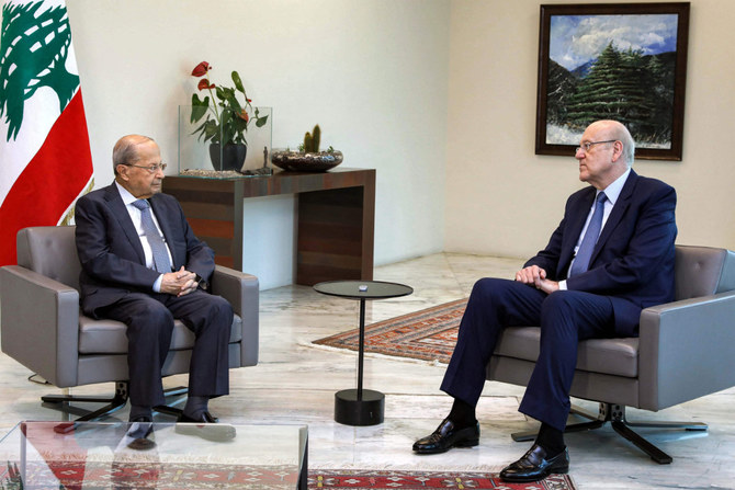 Lebanon's Prime Minister Najib Mikati meeting with President Michel Aoun at the presidential palace in Baabda on June 29, 2022.