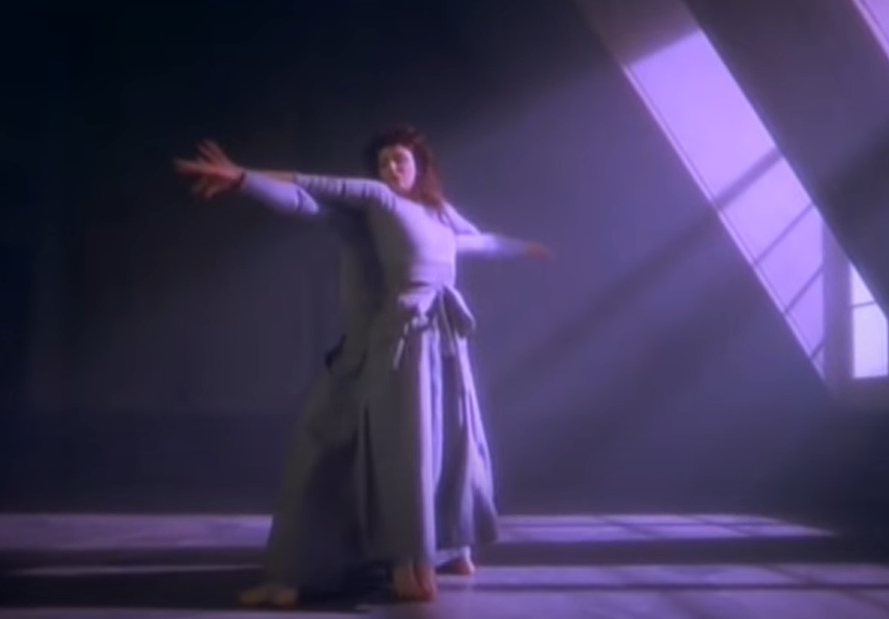 Originally titled Deal with God, the 1985 song features Bush and dancer Michael Hervieu wearing grey Japanese Hakamas, the traditional style of floor-length pants. (Screengrab)