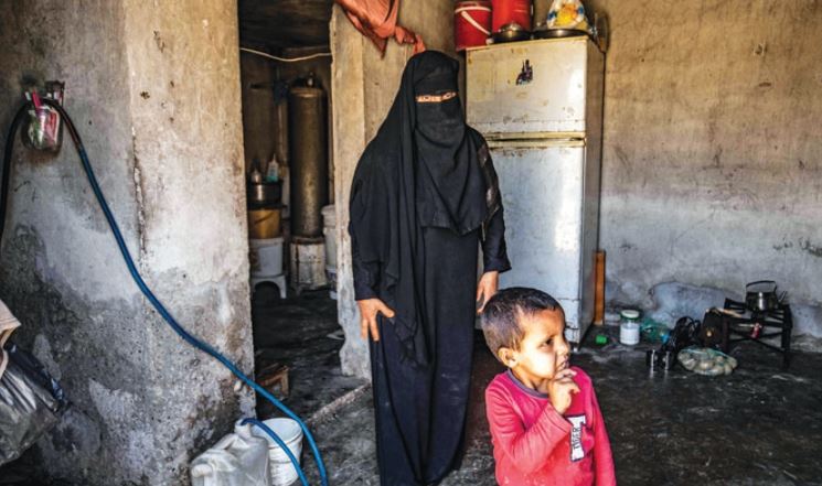 Noura Al-Khalif, a former detainee at the Kurdish-run Al-Hol camp, at her home in Raqqa, Syria. (Reuters)