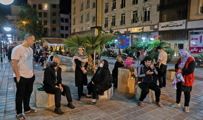 Iranians gather outside their buildings after an earthquake was felt in the capital Tehran on May 7, 2020. (AFP)