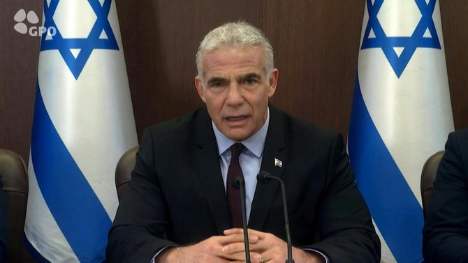 Israeli Prime Minister Yair Lapid will visit France, his first abroad since becoming caretaker premier last week. (AFP)