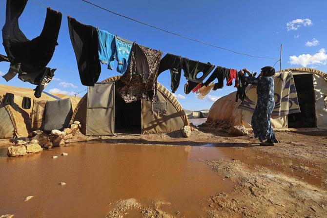 The UN resolution permitting aid deliveries across the Syrian-Turkish border at Bab Al-Hawa has been in effect since 2014. (AP/File)