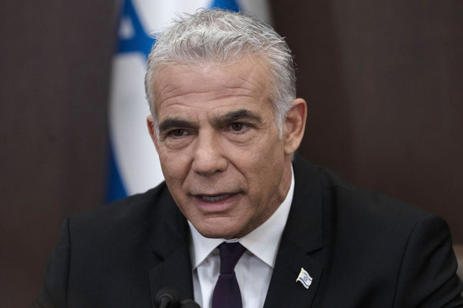 Israeli Prime Minister Yair Lapid speaks at the weekly cabinet meeting in Jerusalem. (AP)