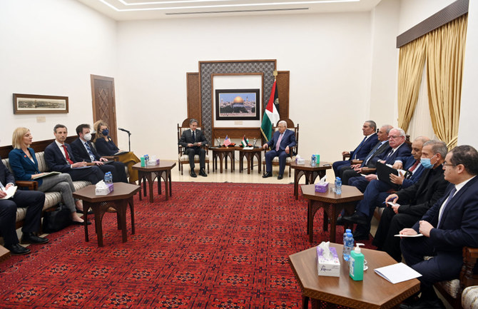 In this March 27, 2022 photo, Palestine President Mahmoud Abbas receives US Secretary of State Anthony Blinken at his headquarters in Ramallah. (PPO handout via AFP)