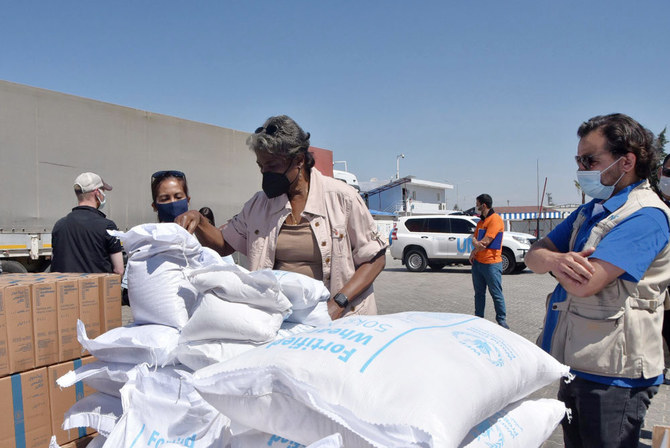 Linda Thomas-Greenfield, US Ambassador to the United Nations, examines aid materials at the Bab al-Hawa border crossing between Turkey and Syria, June 3, 2021. (AP)