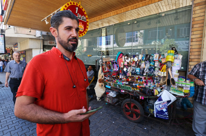 Iraqi Kurd Haresh Talib walks on the streets of Iraq's northeastern city of Sulaymaniyah in the autonomous Kurdistan region, on July 1, 2022. (AFP)