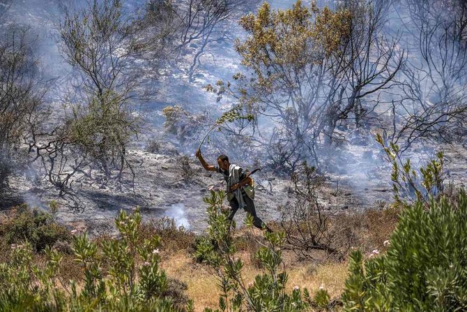 The fires, fanned by strong winds in the four areas, have not resulted in any casualties so far. (AFP)