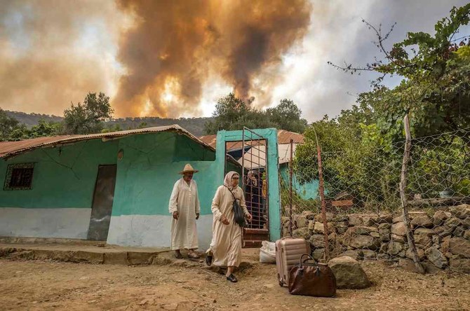 The fires, fanned by strong winds in the four areas, have not resulted in any casualties so far. (AFP)