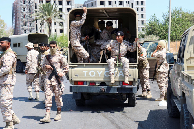 Members of the Libyan armed unit, 444 Brigade, backing the Government of National Unity (GNU), deploy in Tripoli's Ain Zara area on July 22, 2022, to restore peace and order. (REUTERS)