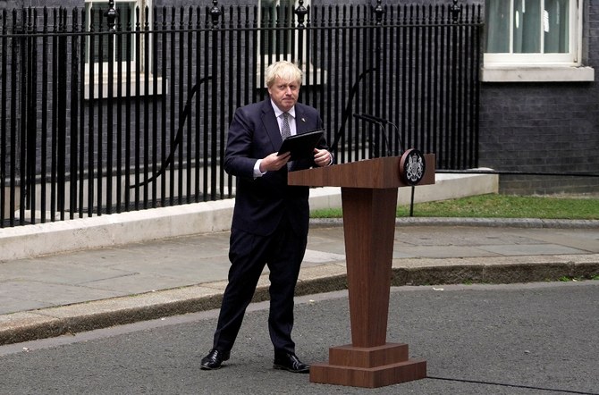 Bowing to the inevitable as more than 50 ministers quit and lawmakers said he must go, an isolated and powerless Johnson spoke outside his Downing Street to confirm he would resign. (AFP)
