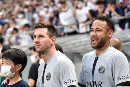 Paris Saint-Germain's Argentinian forward Lionel Messi (left) and Brazilian forward Neymar attend PSG's Japan Tour football match against Gamba Osaka at Suita stadium in Osaka on July 25, 2022. (AFP)