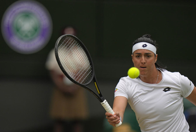 Tunisia’s Ons Jabeur returns to Marie Bouzkova of the Czech Republic in a women’s singles quarterfinal match on day nine of the Wimbledon tennis championships in London on Tuesday. (AP)