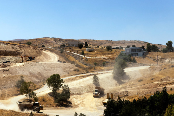 Heavy machinery work at the Israeli settlement of Givaat Saleit in Jordan Valley in the West Bank on July 7, 2022. (REUTERS)