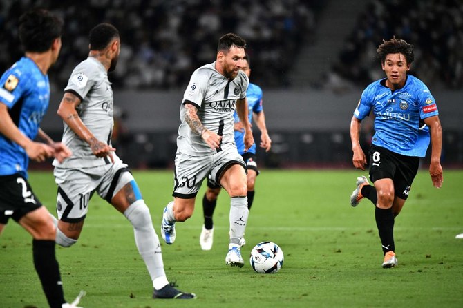 Paris Saint-Germain’s Argentinian forward Lionel Messi runs with the ball during PSG’s Japan Tour football match against Kawasaki Frontale at the National Stadium in Tokyo on Wednesday. (AFP)
