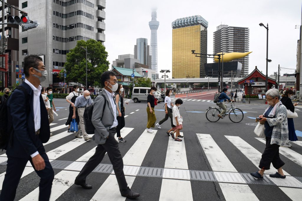 Japan's daily count of new infection cases has been exceeding 200,000 since Tuesday, and hit a record high of some 249,700 Wednesday. (AFP)