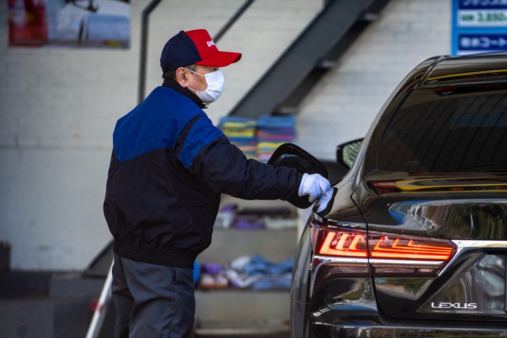 Japan lowered its gasoline subsidy for oil distributors to 32.4 yen (23.7 cents) a litre. (AFP)