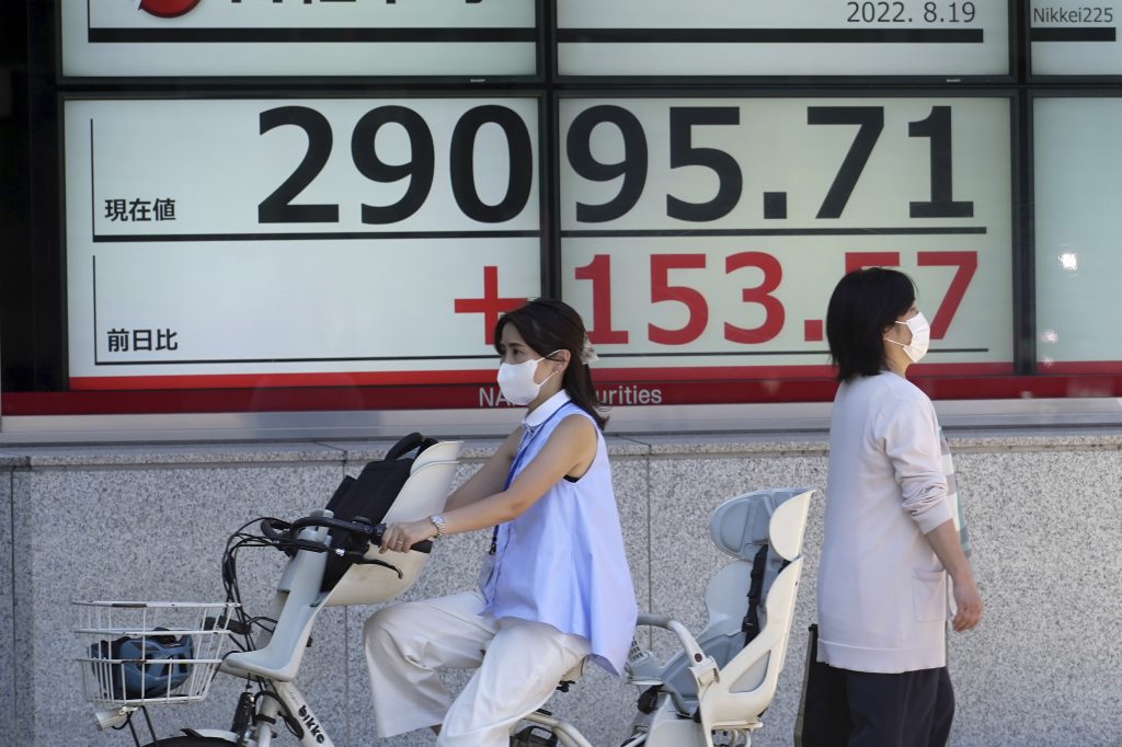The Nikkei 225 index inched down 11.81 points to 28,930.33. (File photo/AP)