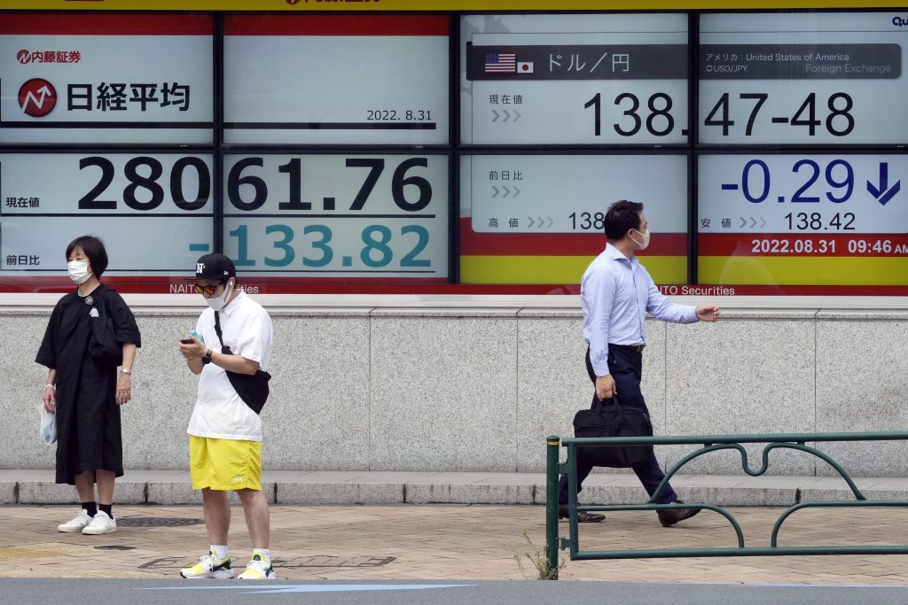 The benchmark Nikkei 225 index lost 0.37 percent, or 104.05 points, to 28,091.53. (File/AP)