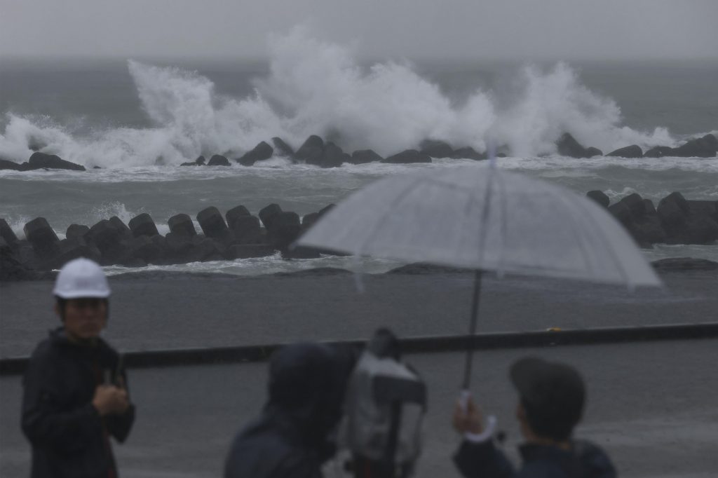 Waves hit ashore as Tropical Storm Meari is moving over coastal waters, in Shizuoka, southwest of Tokyo Saturday, Aug. 13, 2022. Shizuoka Prefecture was told to brace for extremely heavy rainfall. (File photo/Kyodo News via AP)
