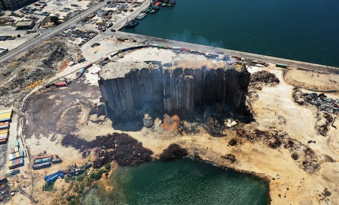 In this July 29, 2022 photo, smoke rises from what was left of Beirut's iconic grain silos after the Aug 4, 2020 explosion. Fire hit the remaining silos last month. (AFP)