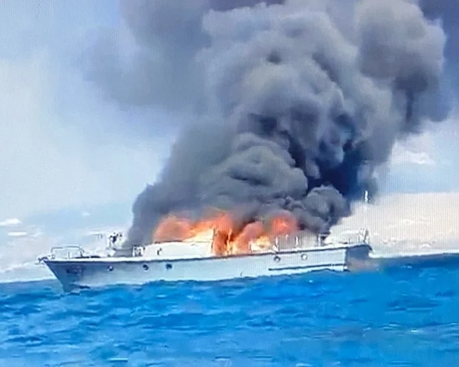 A screengrab of a video showing a Lebanese Army speed cruiser that was caught by fire off Al-Saadiyat coast in southern Lebanon. (Twitter/@BeirutCityGuide)