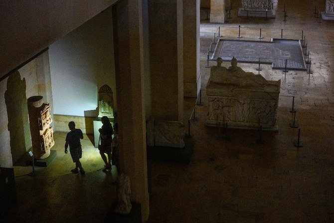 Tourists discover archaeological pieces from Phoenician and Roman times at Lebanese National Museum in Beirut. (AN photo by Ammar Abd Rabbo)