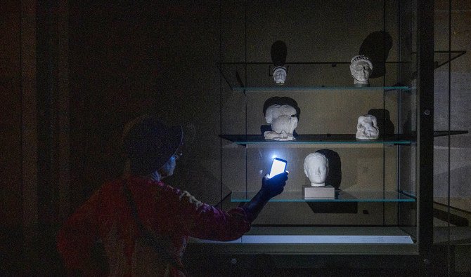 Tourists discover archaeological pieces from Phoenician and Roman times at Lebanese National Museum in Beirut. (AN photo by Ammar Abd Rabbo)
