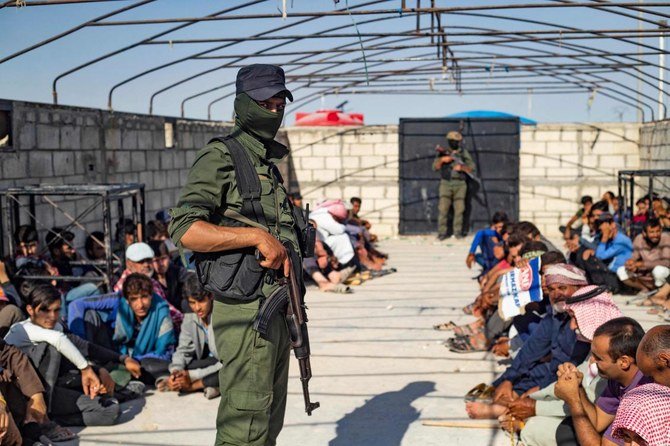 Kurdish-run al-Hol camp, which holds relatives of suspected Daesh group fighters, during a security operation by the Kurdish Asayish security forces and the special forces of the Syrian Democratic Forces. (AFP)