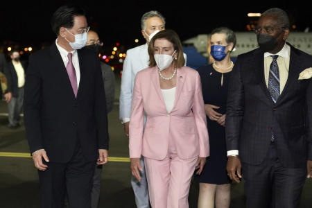 In this photo released by the Taiwan Ministry of Foreign Affairs, US House Speaker Nancy Pelosi (center) walks with Taiwan's Foreign Minister Joseph Wu (left), as she arrives in Taipei, Taiwan, Tuesday, Aug. 2, 2022. (AP)