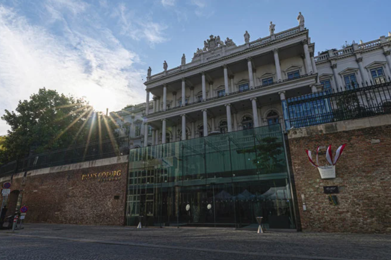The sun sets behind the Palais Coburg where closed-door Iranian nuclear talks were taking place in Vienna, Austria, Aug. 5, 2022. (AP)
