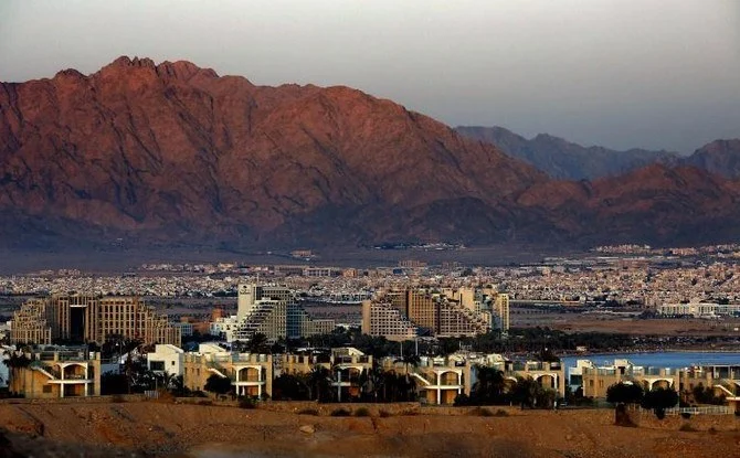 Ramon Airport is about 18 kilometers from the Israeli Red Sea resort of Eilat and the adjacent Jordanian port of Aqaba, above. (AFP/File)