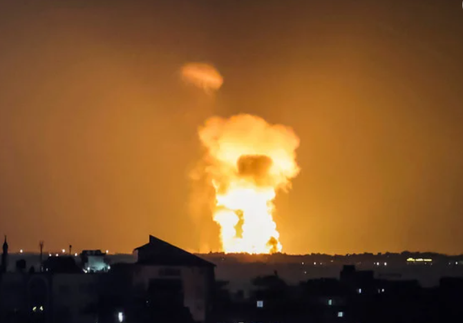 A fireball rises from the site of an Israeli airstrike in Khan Yunis in the southern Gaza Strip Sunday night shortly before a ceasefire took effect. (AFP)