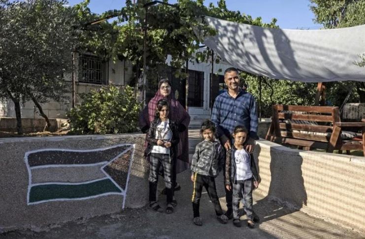 Sa’adat Gharib’s house is located in an enclave at the heart of the Jewish settlement of Givon Hahadasha, north of Jerusalem, bordering the West Bank Palestinian village of Beit Ijza. (AFP)